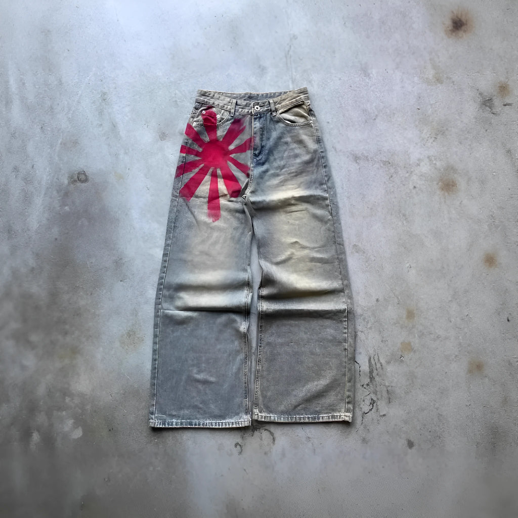 Men's wide-leg blue denim trousers with straight-leg cut and zipper fly, laid flat on a neutral background