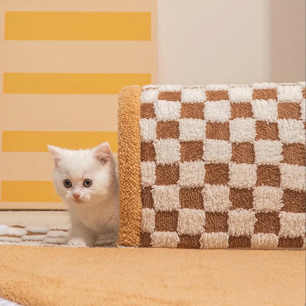 Fan-shaped plush pet bed with integrated tunnel for cats and small dogs in a plaid pattern.