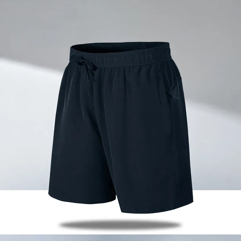 Men's loose fit quick-drying sports shorts in polyester fabric for summer activities