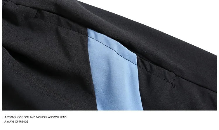 Men's black quick-drying sports shorts with elastic waistband and straight-leg cut for training