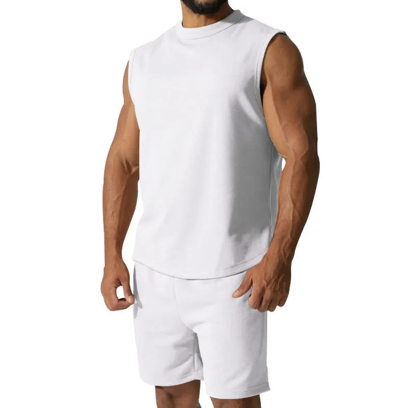 Men's sleeveless cotton blend sports top and matching shorts in solid colour options