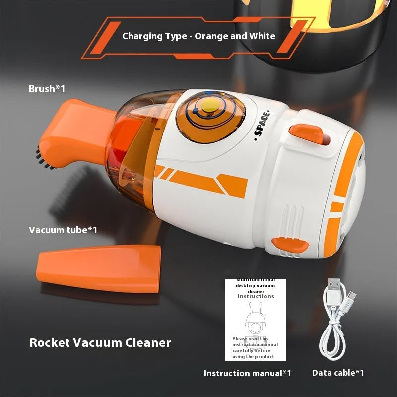 USB handheld desktop vacuum cleaner in blue rocket design on a wooden desk