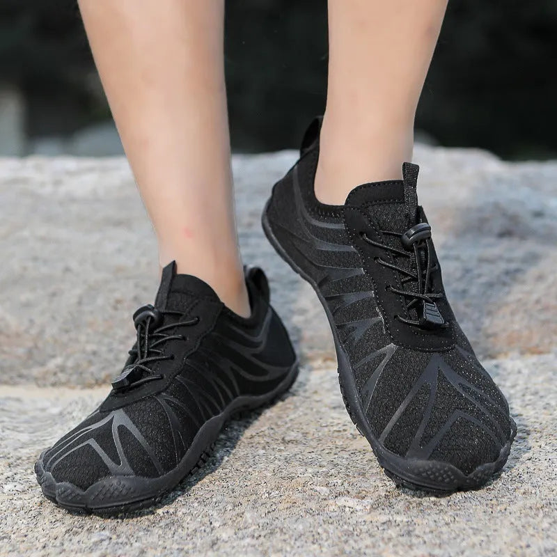 Low-top casual sports running shoe in colour option, showing front lace-up and textured natural rubber outsole.