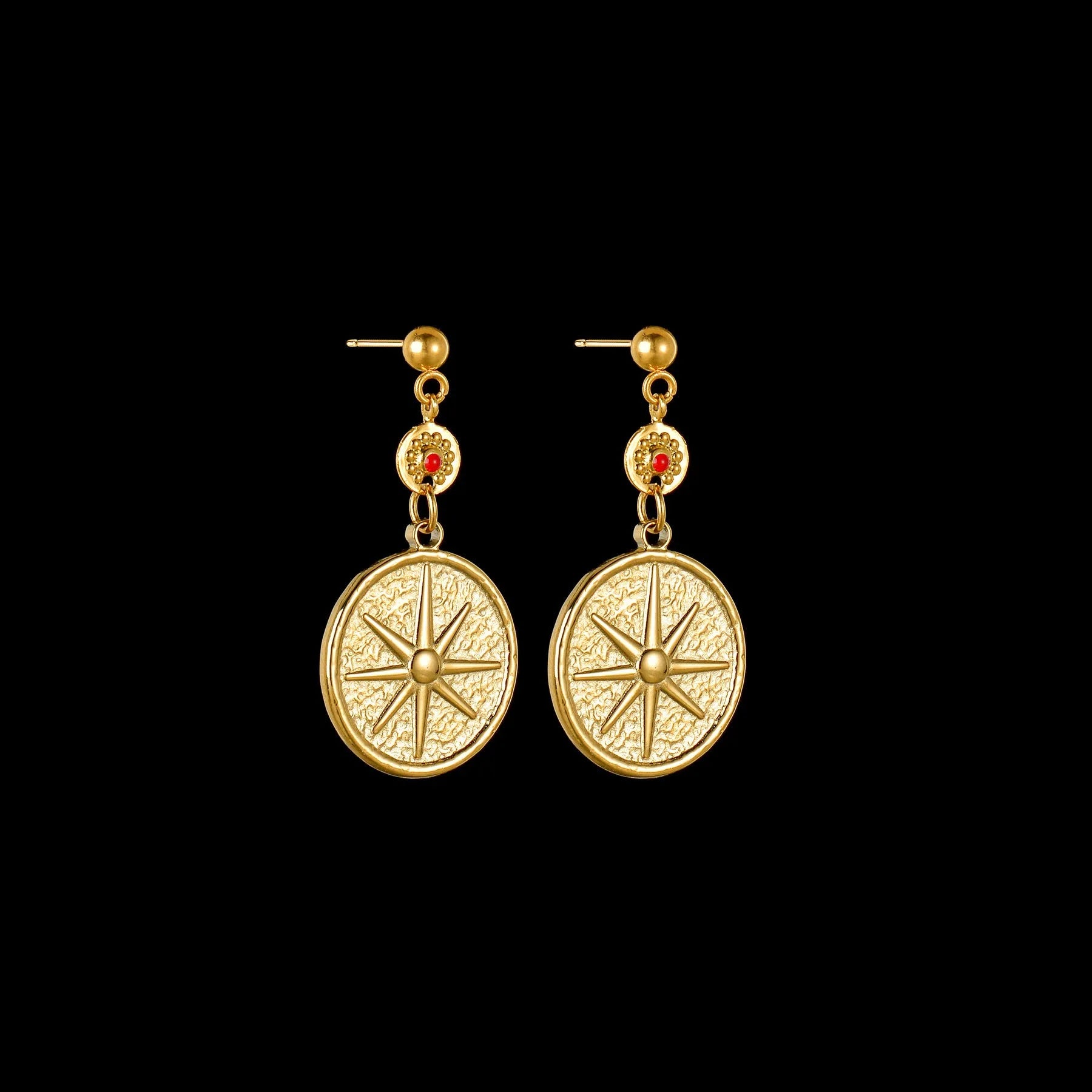 Geometric stainless steel drop earrings showing star, eye and shell sun designs for pierced ears