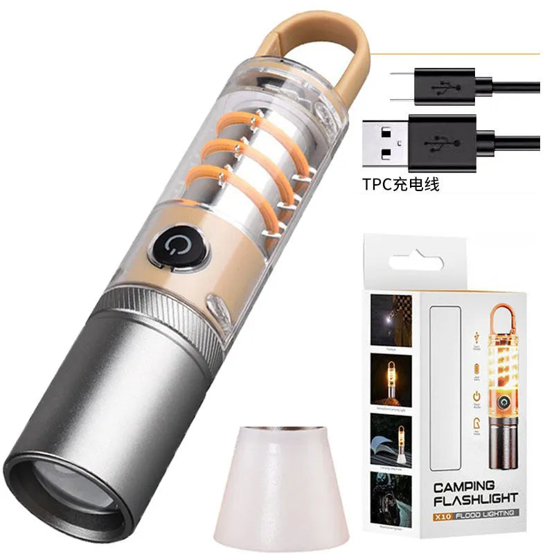 Orange and beige dual light source flashlight with hook and optical zoom ring