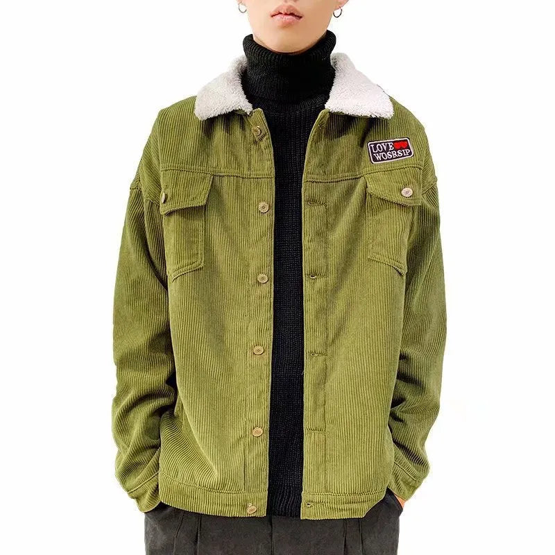 Man wearing a khaki loose-fit corduroy workwear jacket with side pockets.