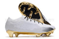 Men's low-top football shoes with knitted upper, rubber FG studs, and front lace-up closure.