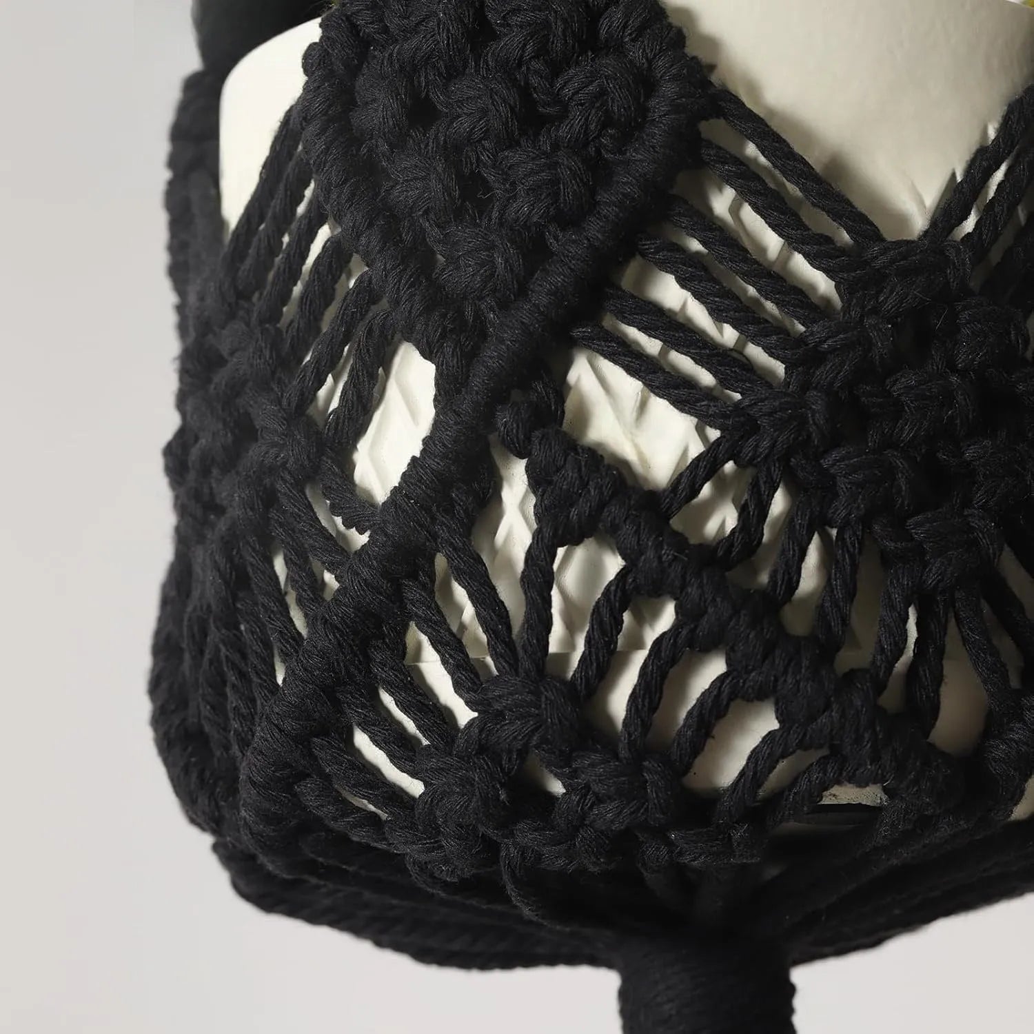 Hand-woven polyester cotton flower pot in minimalist design with textured surface