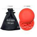 Orange-red golf strength training mat with centre of gravity markings on natural rubber surface