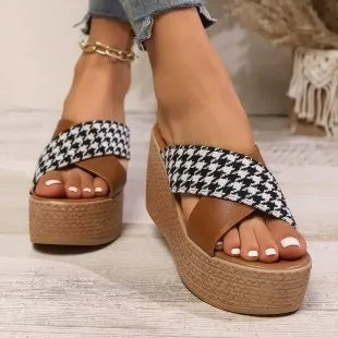 Cross leopard plaid wedge sandals in casual style with rubber soles, available in black or brown patterns.