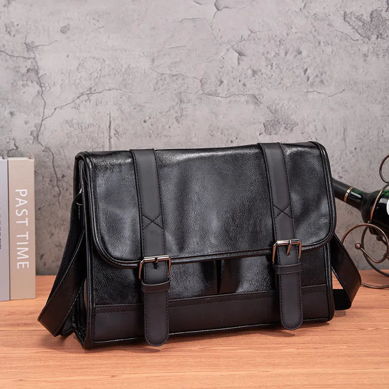 Black Korean-style men's commuter backpack with anti-theft feature and sewing thread detailing.