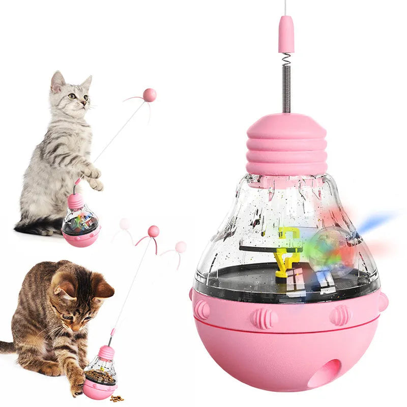 Multi-colour cat interactive toy with rocking base, slow feeder compartment, and bouncing teaser wand with plastic ball attachment