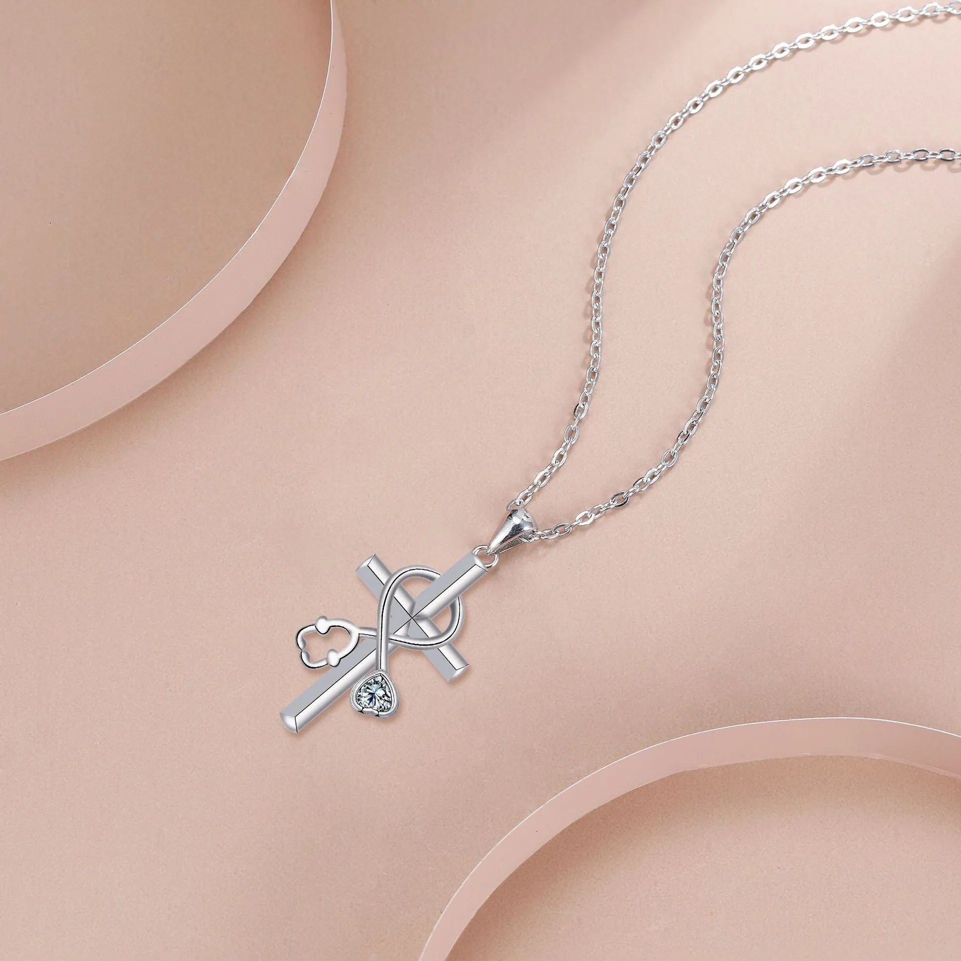 Original design cross stethoscope necklace for women with electroplated copper pendant.