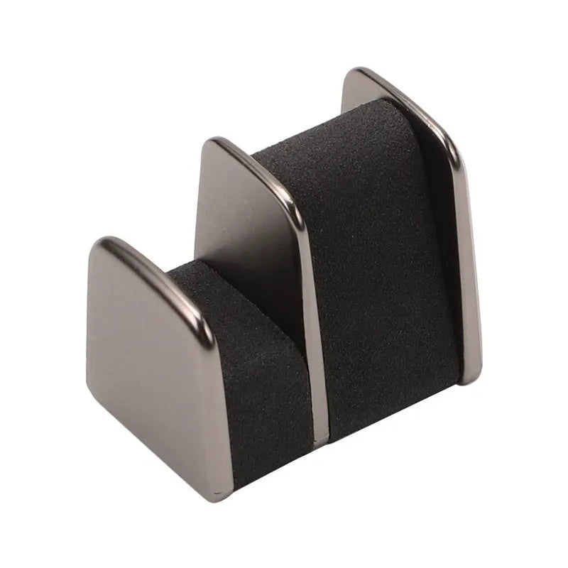 Zinc alloy and leather sunglasses clip for car dashboard storage in four colour options.