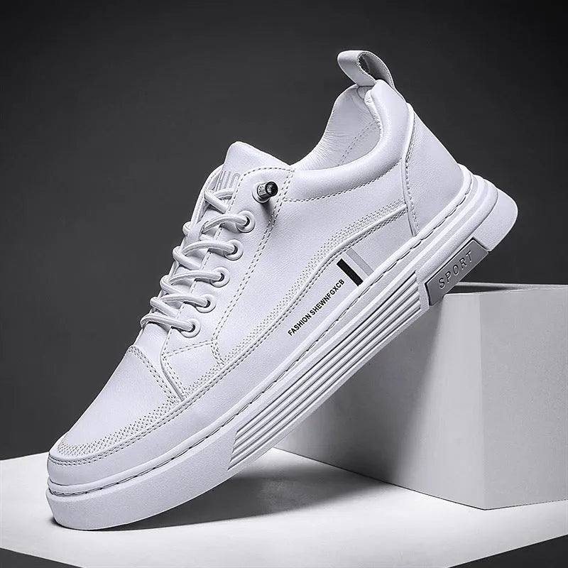 Men's white and black low-top skate shoes with an elastic band and round toe on a rubber sole.