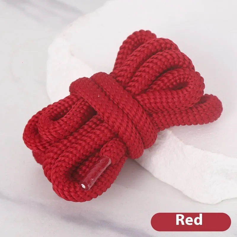 A selection of round braided shoelaces and hoodie cords in various colours, showing 1.0cm width