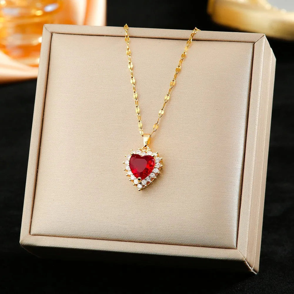 Women's titanium steel jewellery set with heart-themed mixed gem pendants in gold red colour