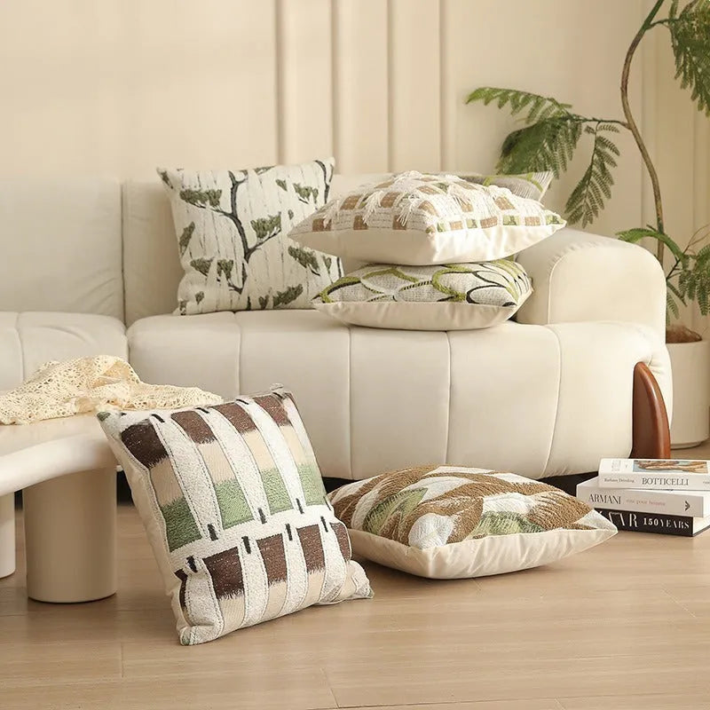 Jacquard floral pattern cushion cover in a retro colour, 45cm square, on a sofa.