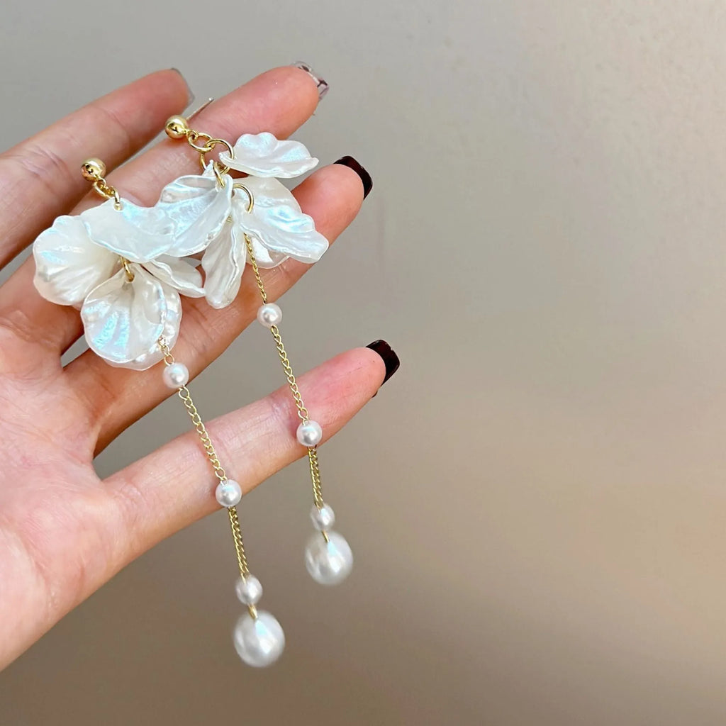 Women's shell pearl tassel earrings with four clip options measuring 8.8cm length