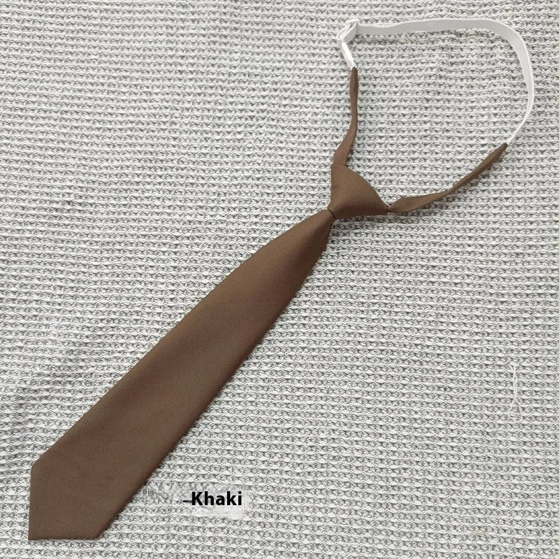 Men's solid colour cotton bow tie in arrow style, showing navy blue colour option.