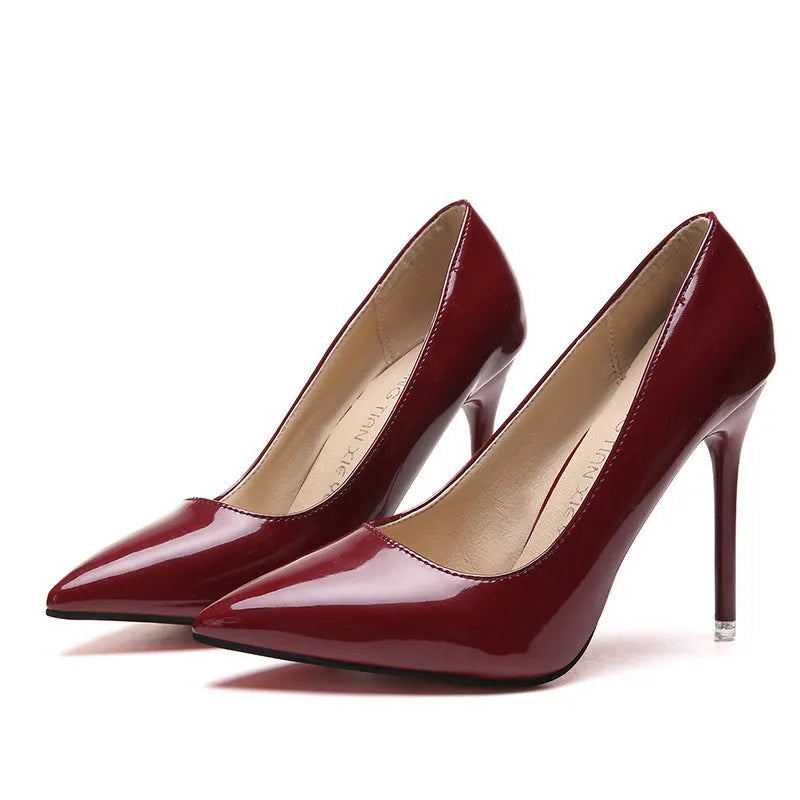 Women's stiletto heel pumps in apricot colour with pointed toe and buckle detail