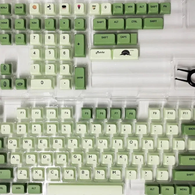 124 PBT keycaps in Matcha green colour arranged by language layout for mechanical keyboards