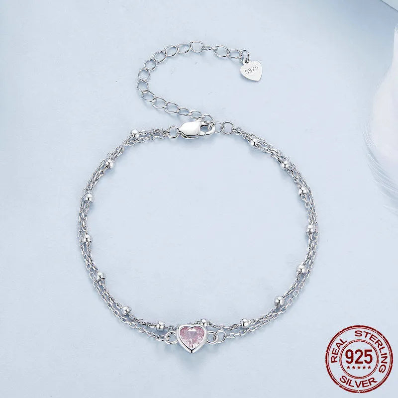 Sweet girlish heart-shaped sterling silver bracelet with a 6mm pendant on an adjustable chain