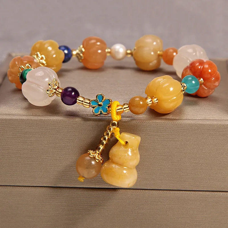 Khaki yellow agate and crystal women's bracelet on gold silk string.