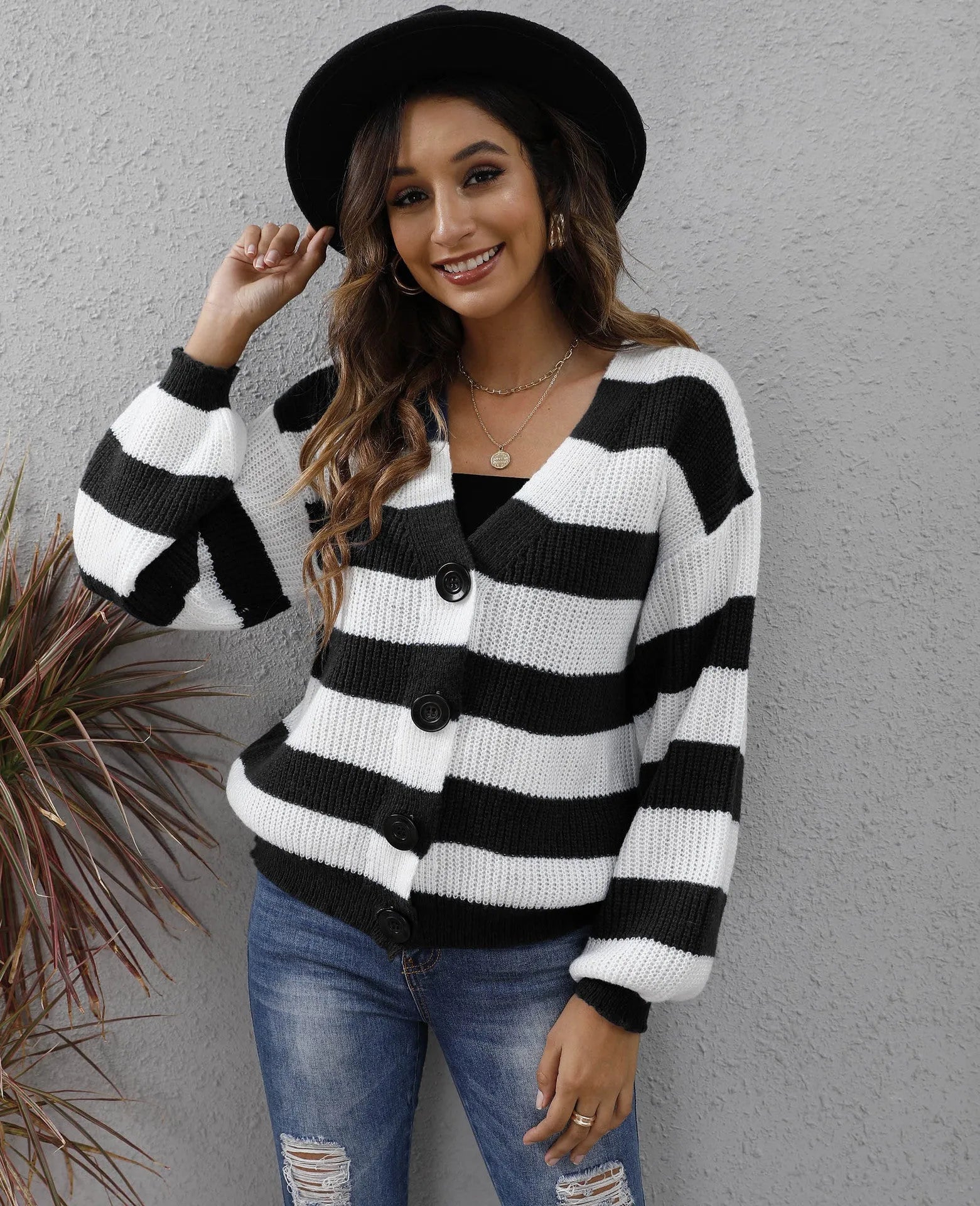 Women's striped deer plush cardigan in blue, showing button front and regular sleeves.
