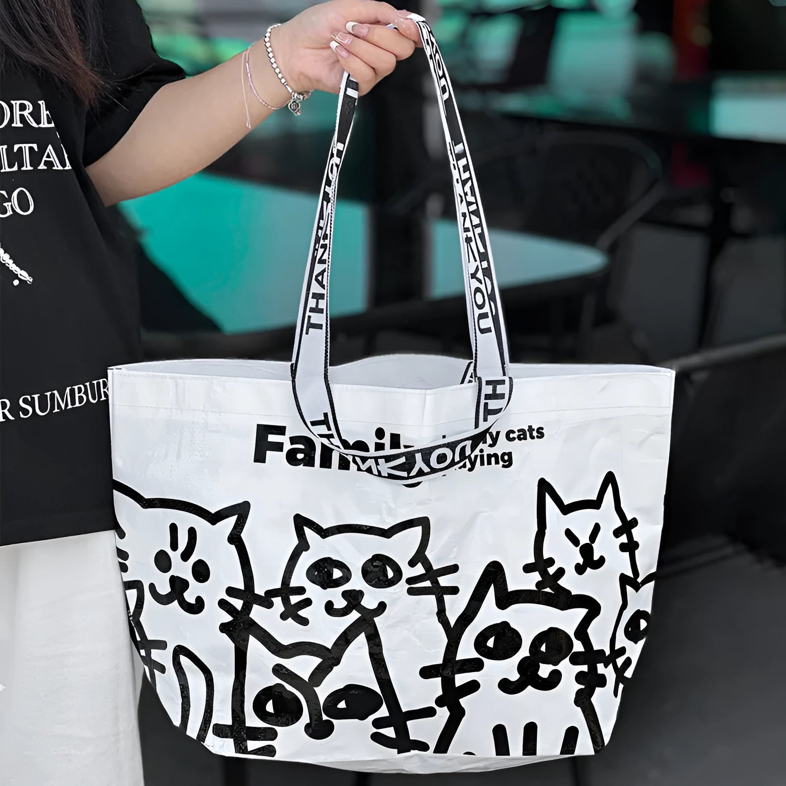 Green waterproof PP woven handbag with colour printing and snakeskin-style woven pattern
