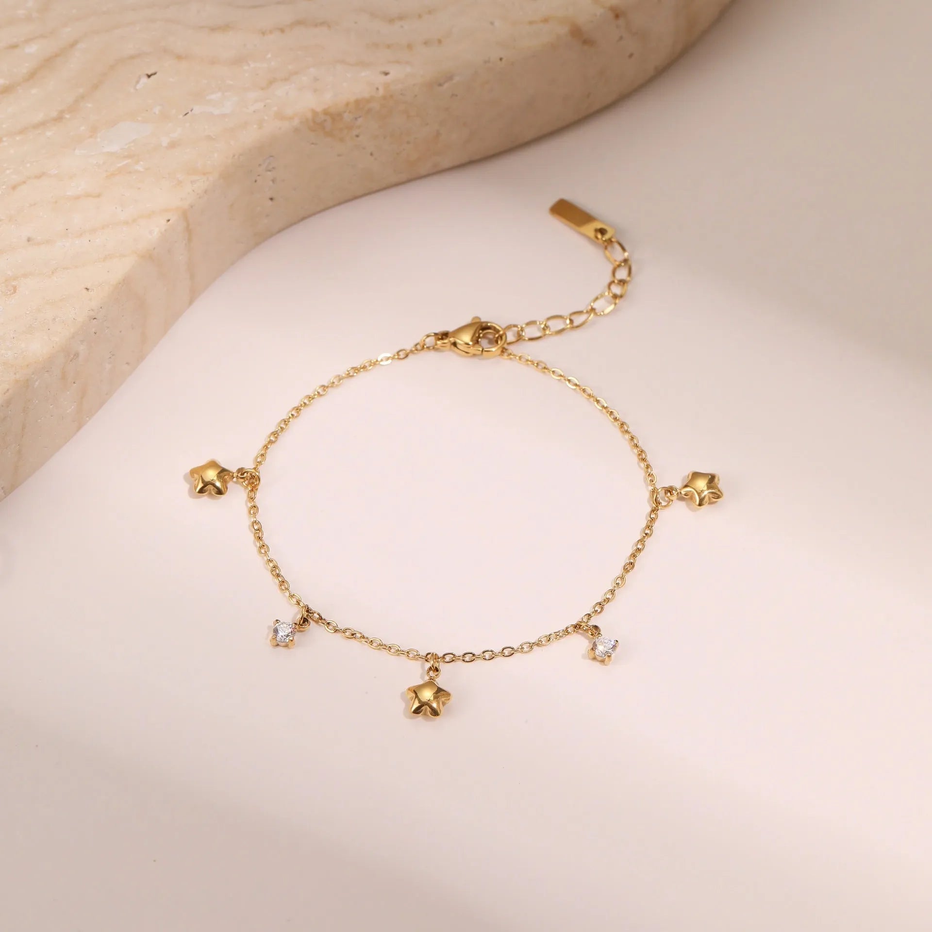 Ins Titanium Steel women's bracelet with 18K gold plating and geometric star zircon pendant
