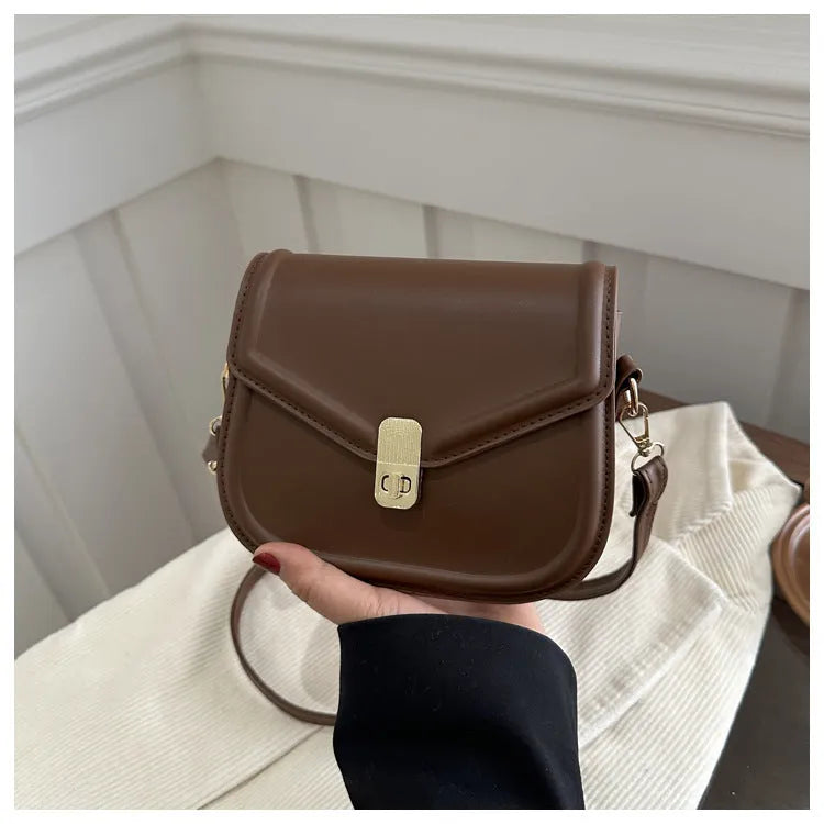 Niche textured PU shoulder messenger bag in soft horizontal square clamshell design