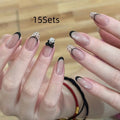 A set of artificial press-on false nails for women in assorted random colours and patterns.