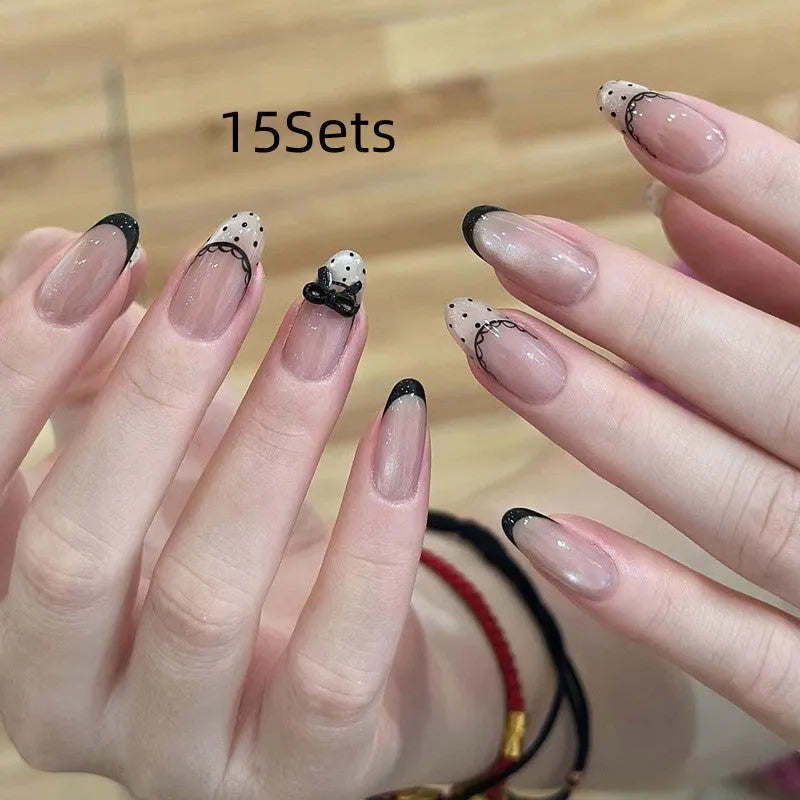 A set of artificial press-on false nails for women in assorted random colours and patterns.