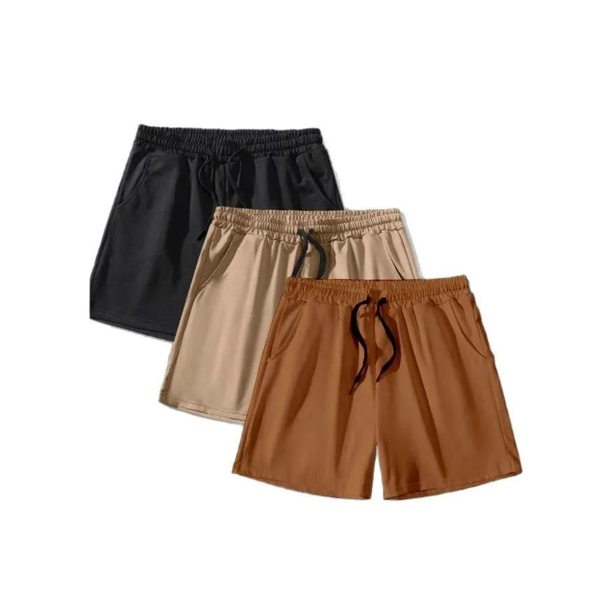 Men's 3-piece drawstring shorts set in black, khaki, and light brown colours showing loose fit design