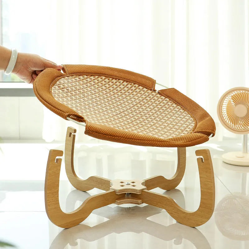 Brown woven rattan pet bed hammock for cats and small dogs, off-ground design