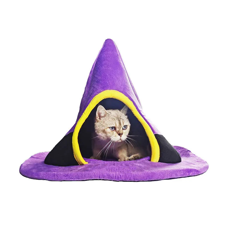 Purple cloth Halloween witch hat shaped cat bed measuring 60 by 45 centimetres