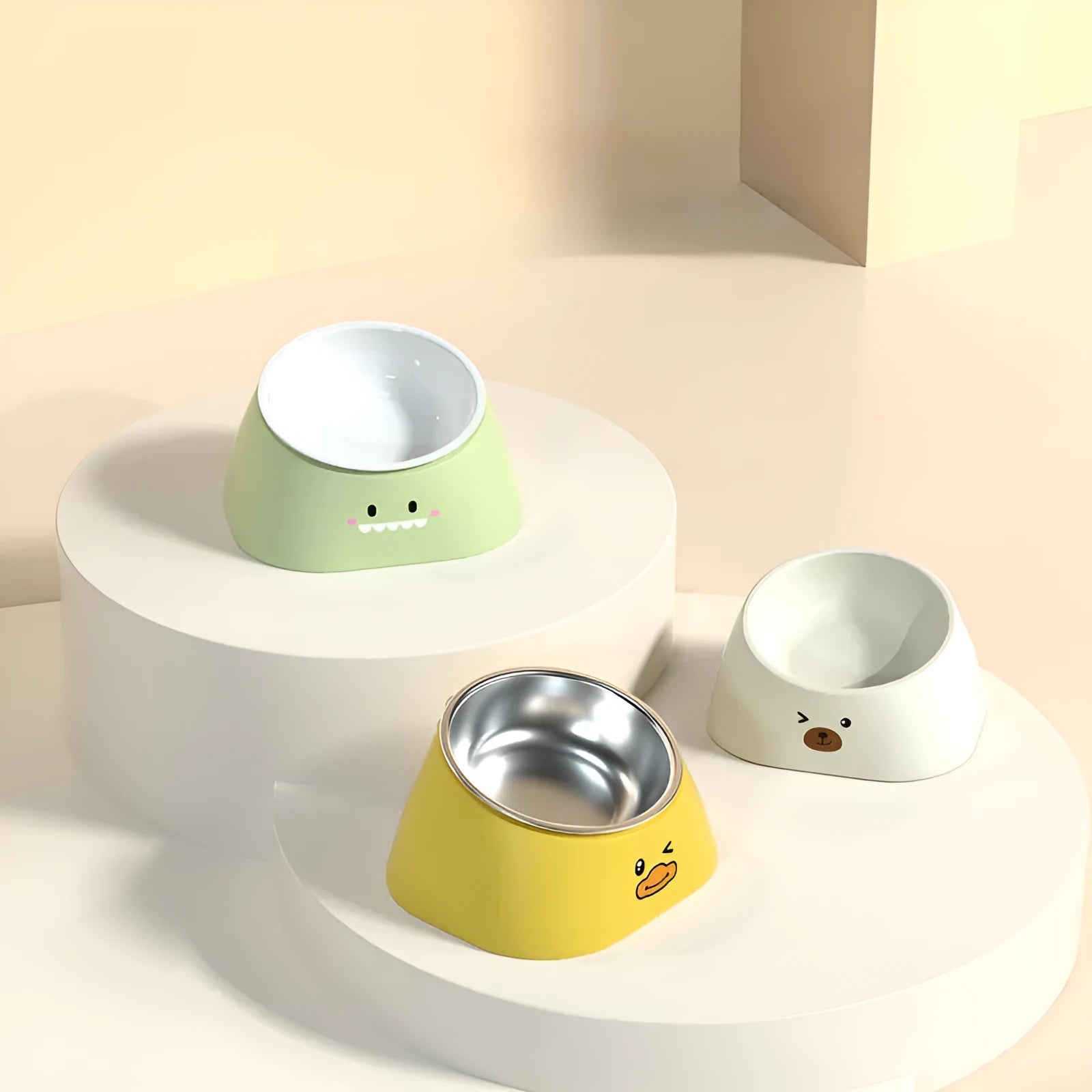 Green tilted stainless steel cat bowl at a 15-degree angle on a table.