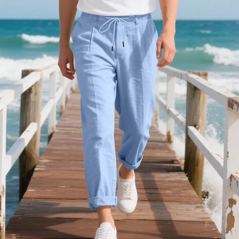 Men's casual linen trousers in light khaki colour with drawstring waist and straight leg