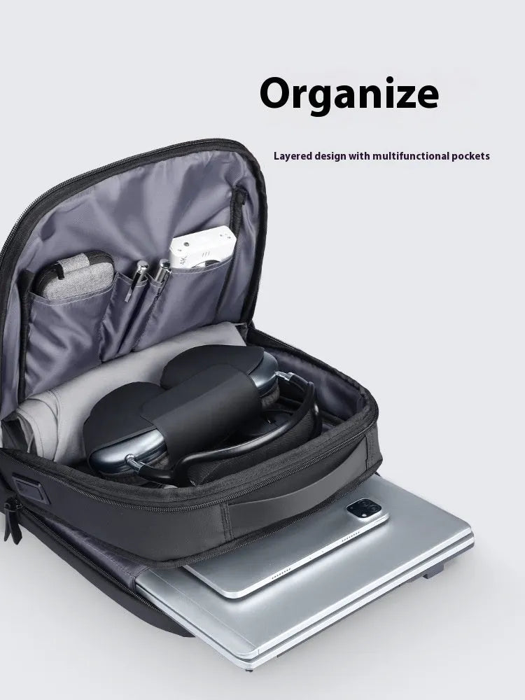 Graphite grey USB charging business backpack made from Oxford cloth with sewn thread detailing.