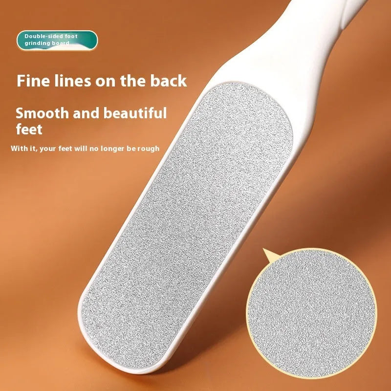 Stainless steel foot grinder with double-sided black and white sandpaper surfaces for callus removal