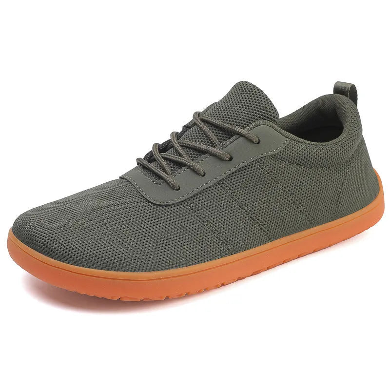 Men's low top walking shoes in Flyknit with non-slip rubber sole, shown in black colour with lace-up front.