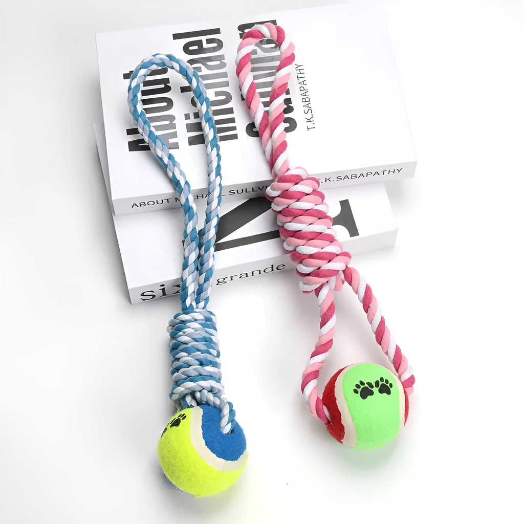 Red and white cotton string dog toy with ventilation holes, measuring approximately 38cm in length
