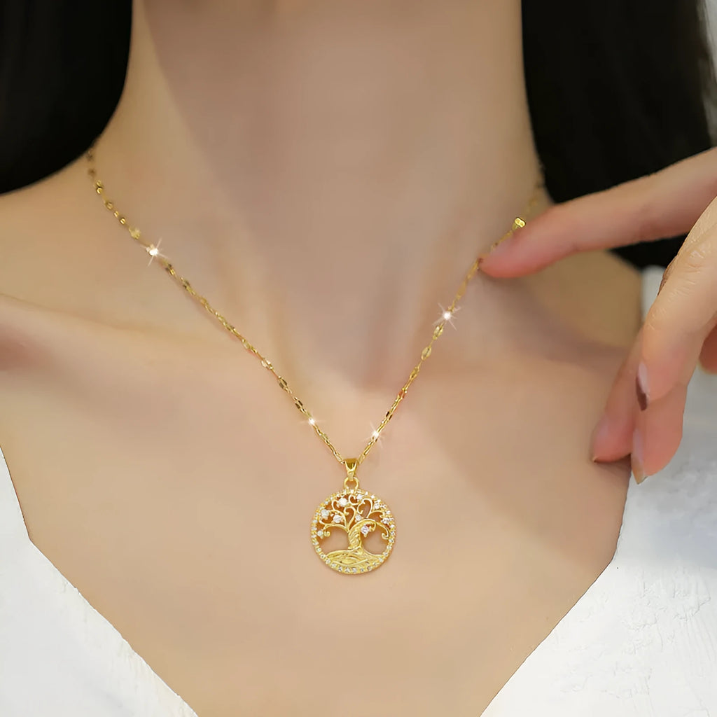Gold-plated necklace with rhinestone lucky tree pendant and mother of pearl cross on adjustable chain