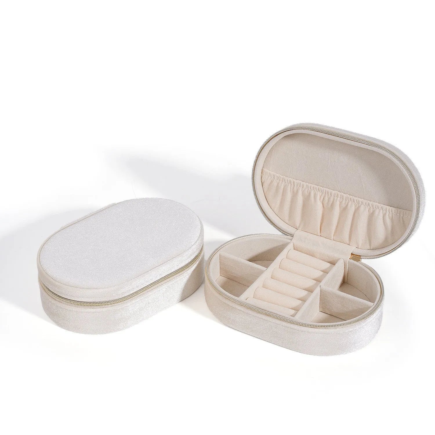 Oval velvet jewellery storage box in lake blue colour, showing flannel-lined interior and compact size.