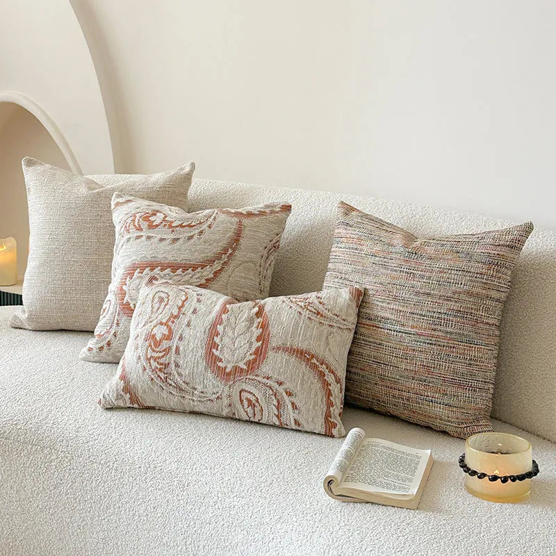 American-style Jacquard sofa backrest cushion with yarn-dyed paisley pattern in amber colour variations