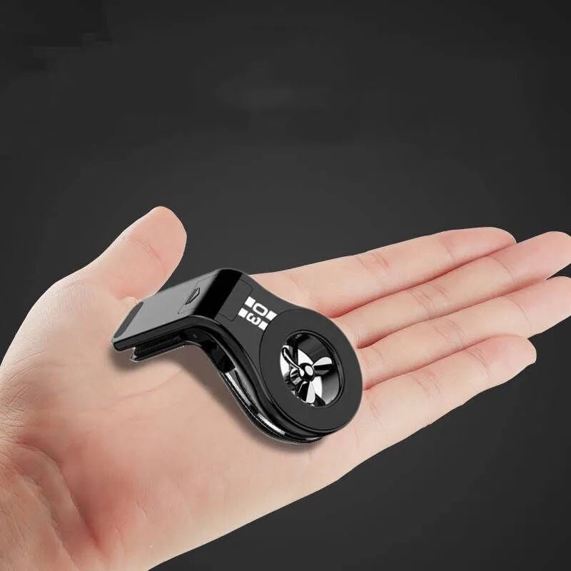 Magnetic car air vent phone holder with adjustable paddle in black colour showing smartphone attached
