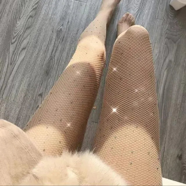 Women's fishnet stockings with diamond pattern mesh in skin colour, black, or white