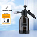Black plastic 2-litre foam watering can sprayer with handle and spray nozzle.