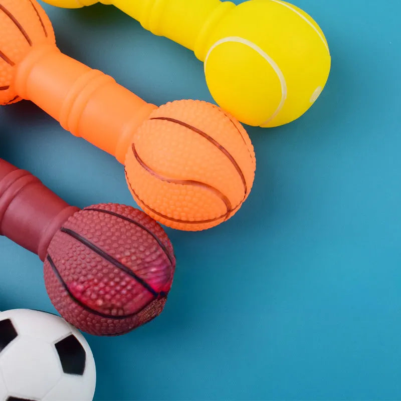 PVC football dumbbell shaped dog toy with squeaker in brown, orange, white and yellow colours